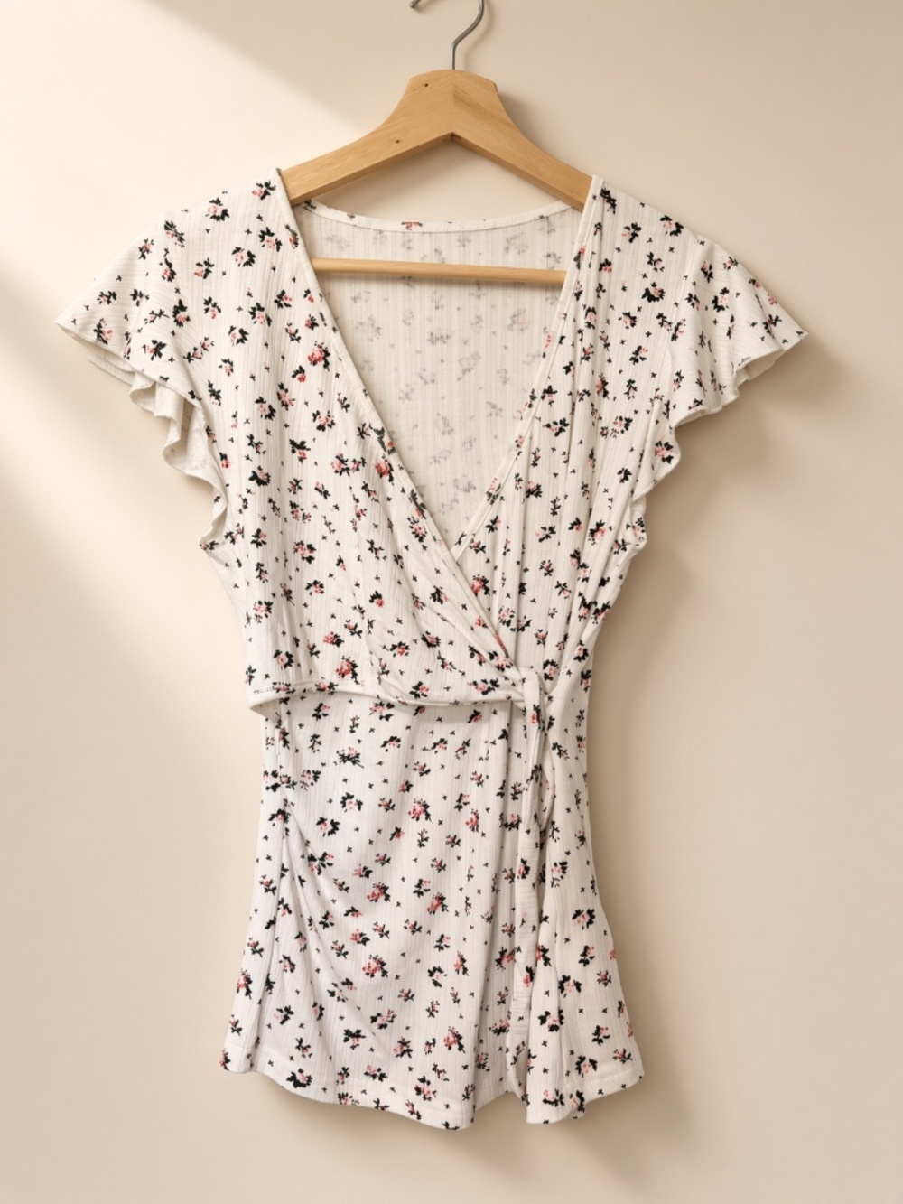 White floral flutter-sleeve wrap top